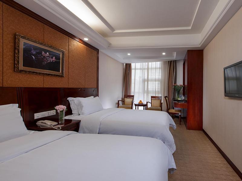 Vienna Hotel Shenzhen Pingdi Exterior photo